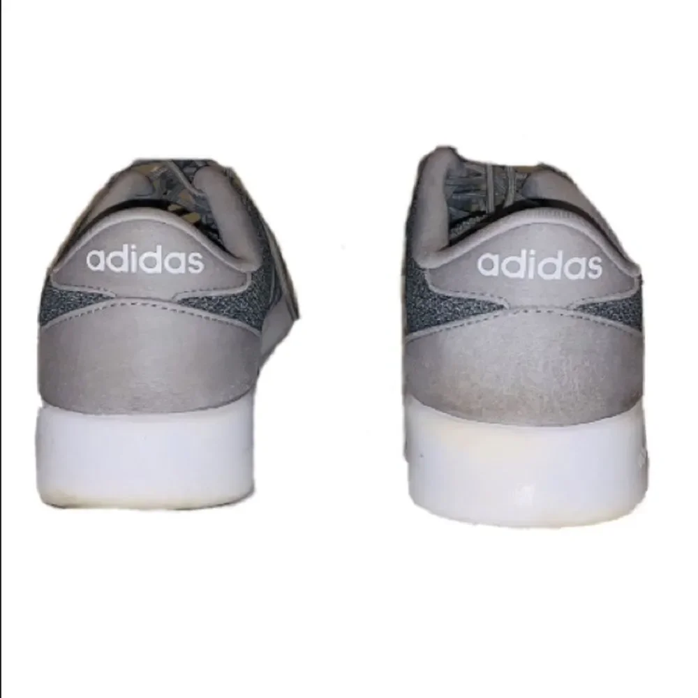 Women’s Adidas QT Racer size 7.5